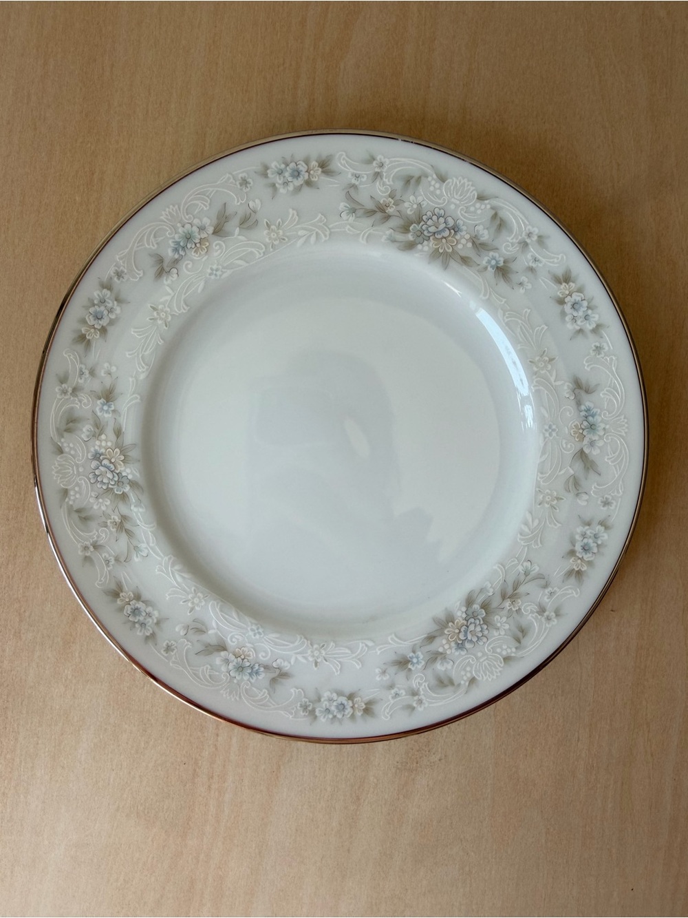 Noritake Cream China Plate with Pale Blue Floral Motif and Silver-Gold Rim